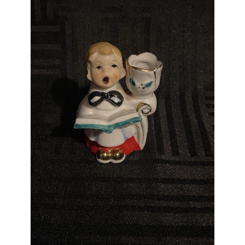 Vintage singing Choir boy holding hymn book candle stick holder